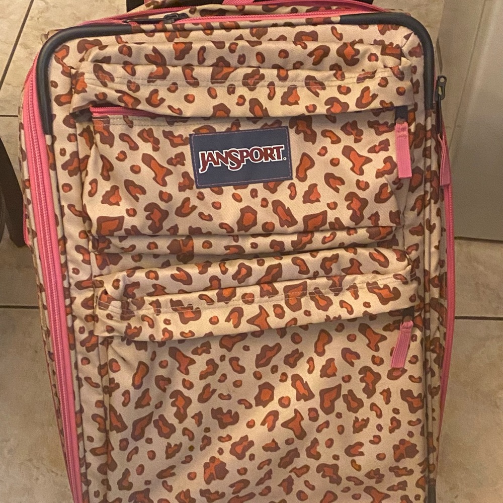 Jansport Animal Print Suitcase with wheels. Great